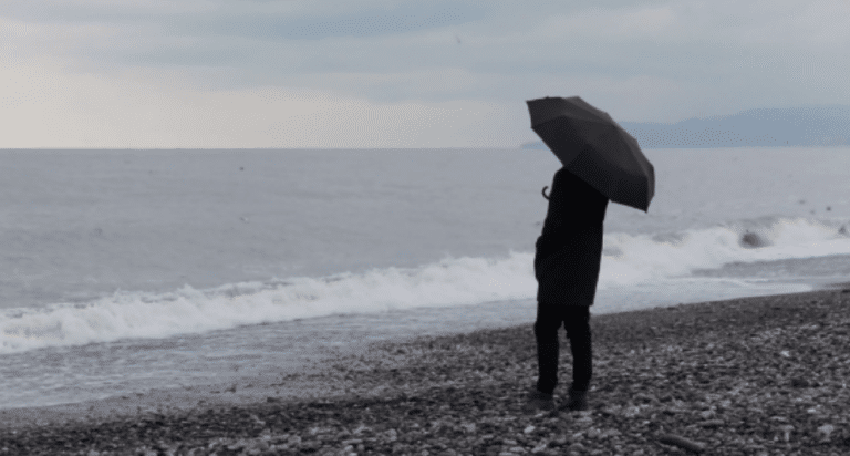 Persona Bajo la Lluvia